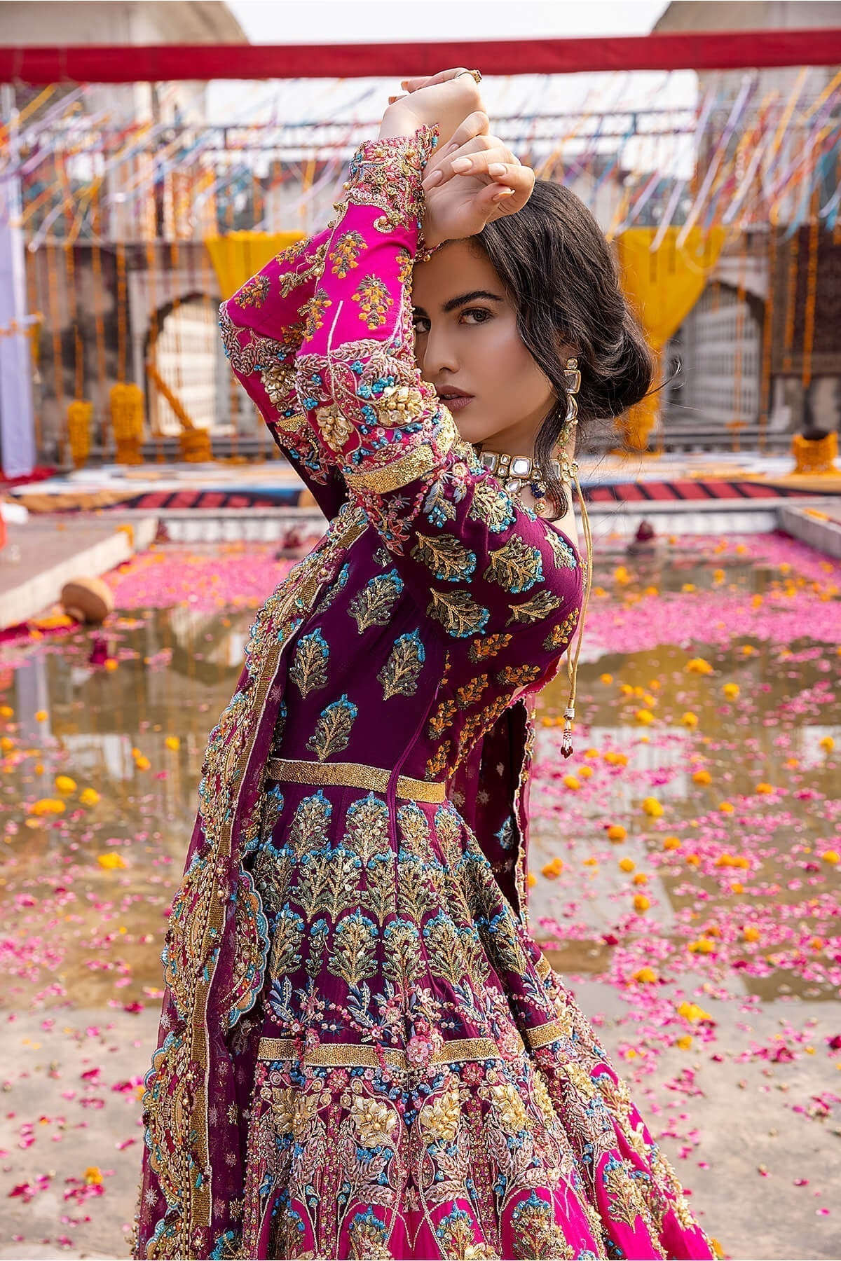 Mina Kashif Mahrosh luxury Pakistani formal ensemble featuring intricate hand embellishments and refined craftsmanship on a gracefully draped silhouette, perfect for weddings and formal occasions.