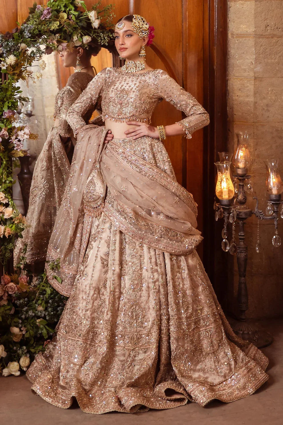 Naqshi Shabaab luxury formal couture outfit front view featuring heavily hand-embellished long shirt with intricate naqshi, dabka, kora, sitara, cutdana and crystal embroidery arranged in rich Mughal inspired floral and geometric patterns, detailed neckline and sleeves with full adda work, paired with matching embroidered trousers and heavily decorated dupatta with ornate borders, fine resham threadwork and shimmering sequin spray, premium Pakistani designer outfit perfect for weddings, festive occasions, m