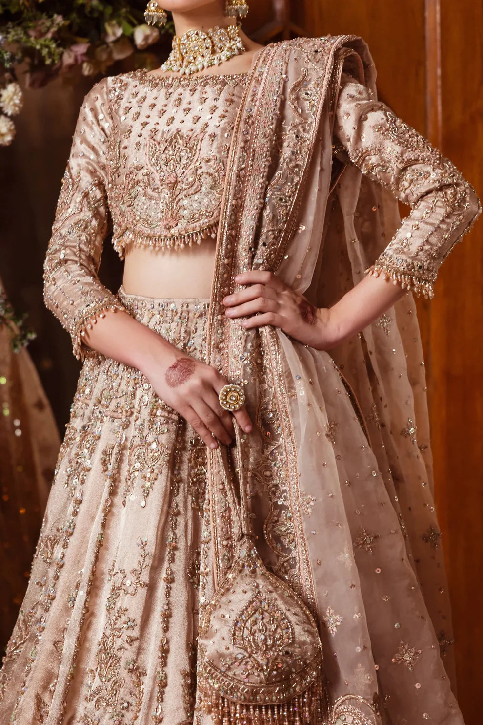 Naqshi Shabaab luxury formal couture outfit front view featuring heavily hand-embellished long shirt with intricate naqshi, dabka, kora, sitara, cutdana and crystal embroidery arranged in rich Mughal inspired floral and geometric patterns, detailed neckline and sleeves with full adda work, paired with matching embroidered trousers and heavily decorated dupatta with ornate borders, fine resham threadwork and shimmering sequin spray, premium Pakistani designer outfit perfect for weddings, festive occasions, m