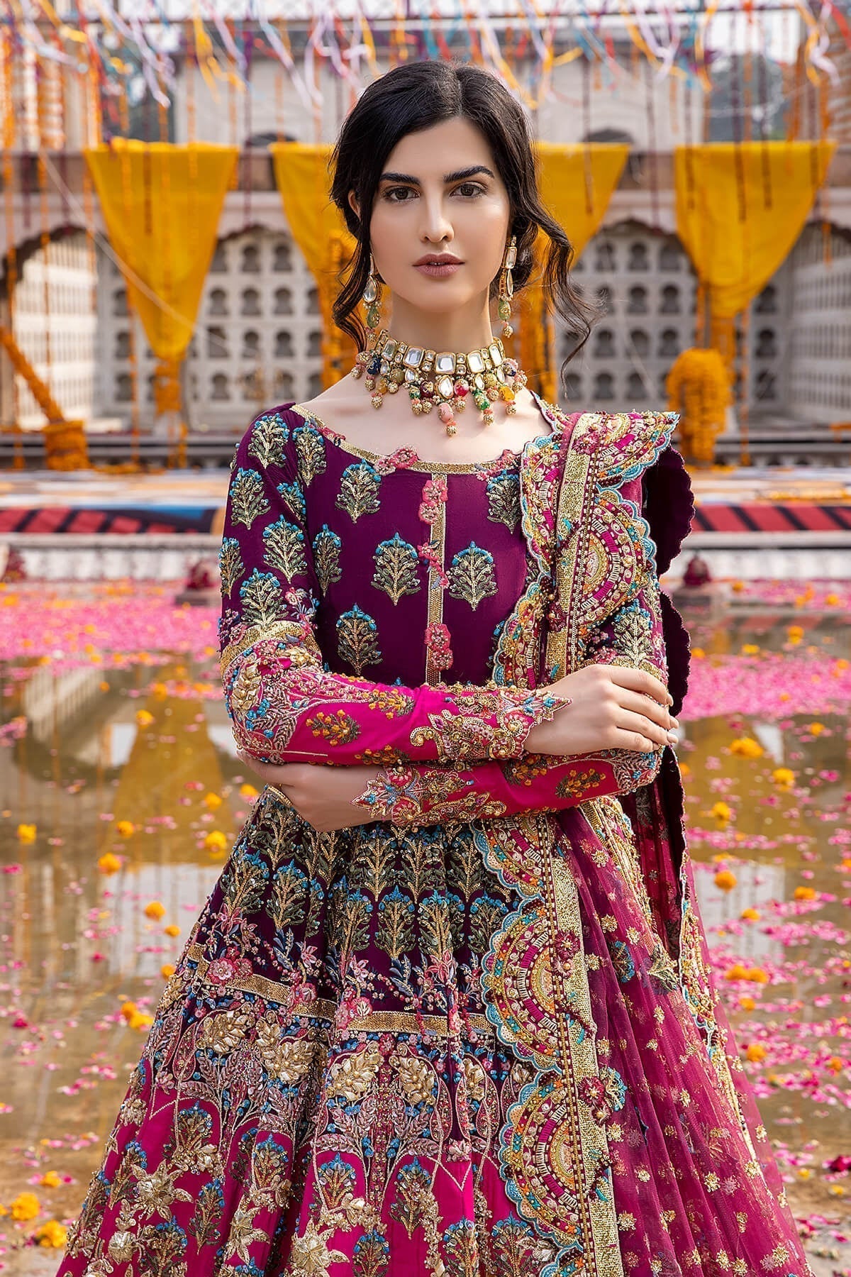 Mina Kashif Mahrosh luxury Pakistani formal ensemble featuring intricate hand embellishments and refined craftsmanship on a gracefully draped silhouette, perfect for weddings and formal occasions.