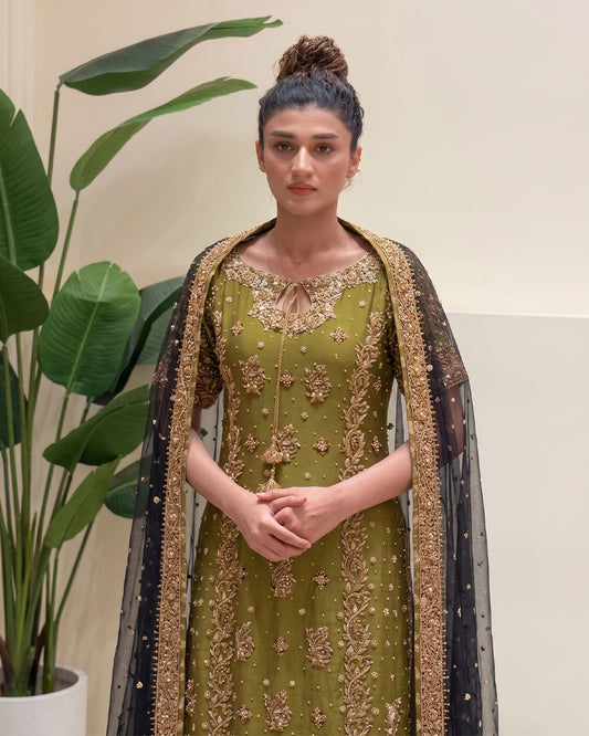 Rehma Zaman luxury embroidered net dress with orange silk trouser and net dupatta by Bisma Noor