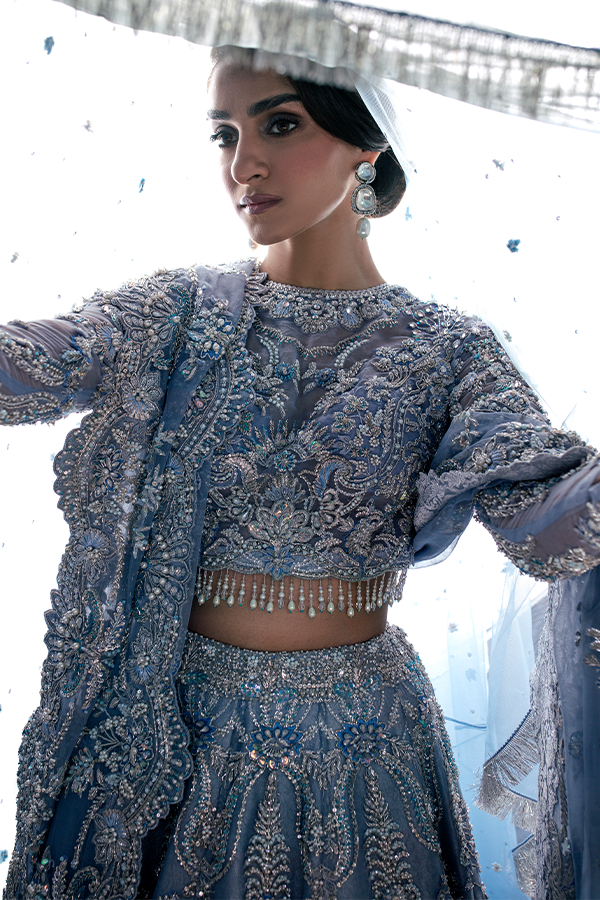 Aarzu Nyra Couture bridal outfit heavy resham naqshi and dabka embroidery
Elegant wedding lehenga choli sky blue with pearls and sequin detailing
Premium bridal ensemble full look Aarzu The Nyra Couture