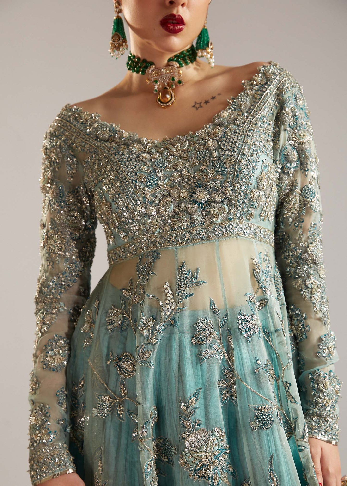 Closeup of Astra peshwas bodice with intricate heavy embellishment front and back
