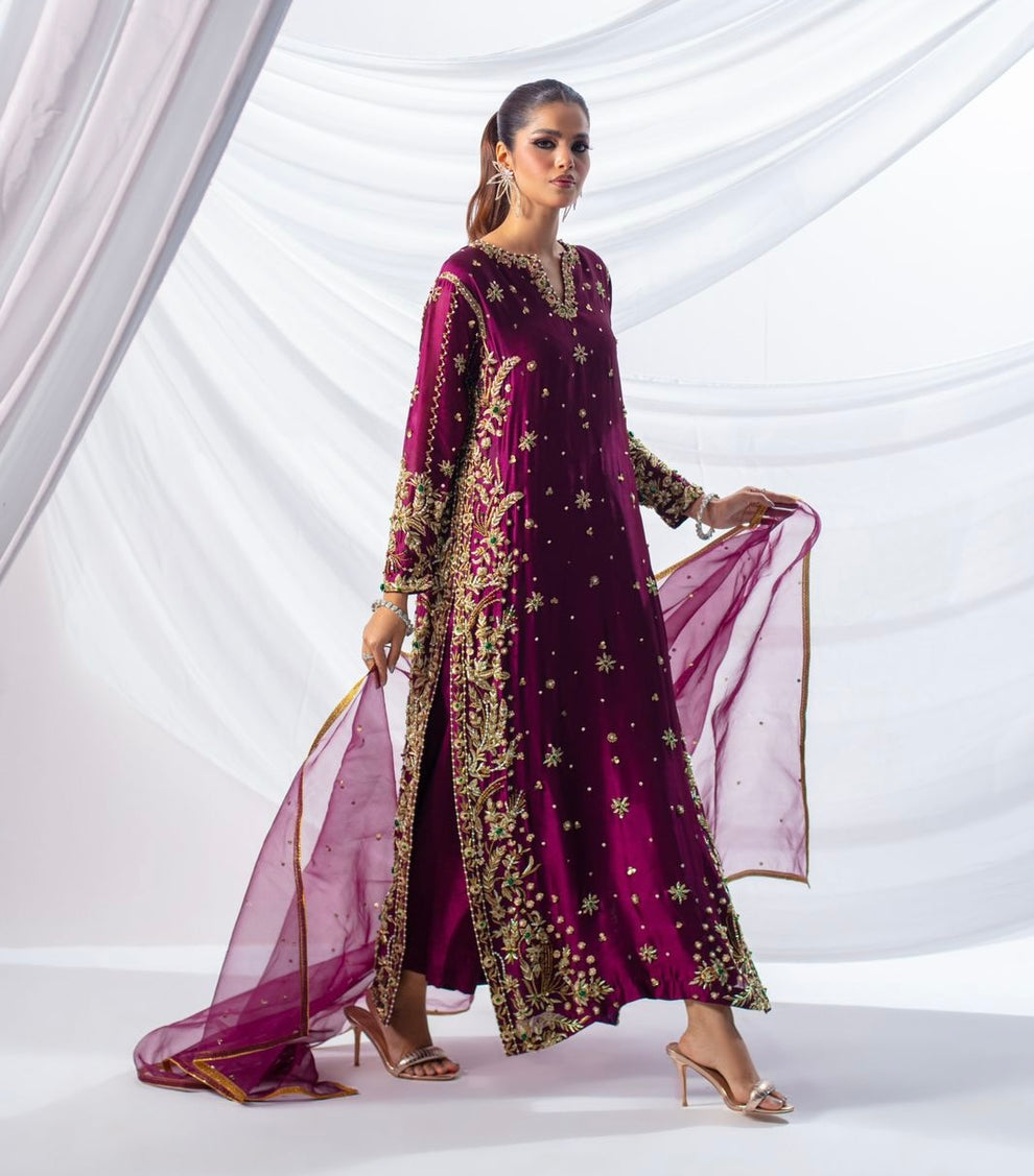 Detailed hand embellishments on magenta formal suit outfit
Premium Pakistani magenta embroidered formal dress full look
Expressive Magenta formal dress elegant wedding and festive wear