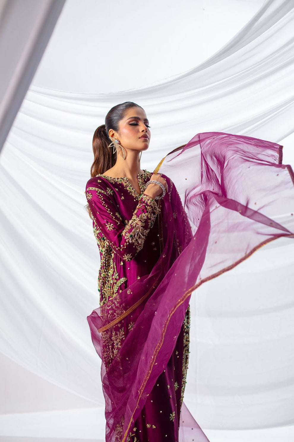 Detailed hand embellishments on magenta formal suit outfit
Premium Pakistani magenta embroidered formal dress full look
Expressive Magenta formal dress elegant wedding and festive wear