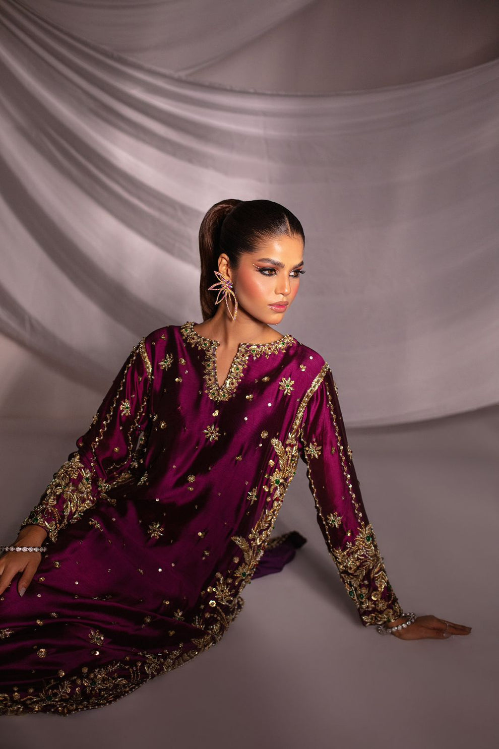 Detailed hand embellishments on magenta formal suit outfit
Premium Pakistani magenta embroidered formal dress full look
Expressive Magenta formal dress elegant wedding and festive wear