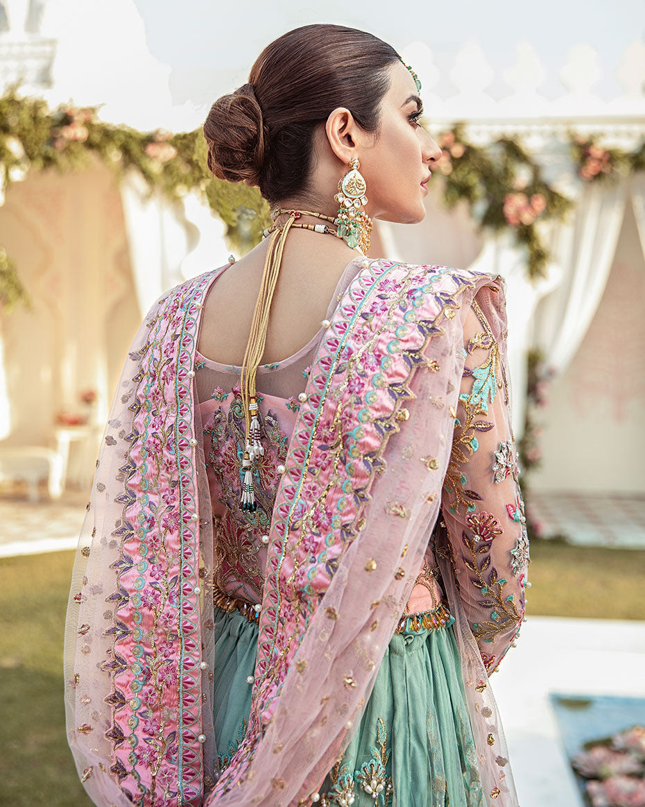 Gulaal Joli luxury rajkumari lehenga choli front view
Gulaal Joli bridal lehenga choli with pink and sea green combination