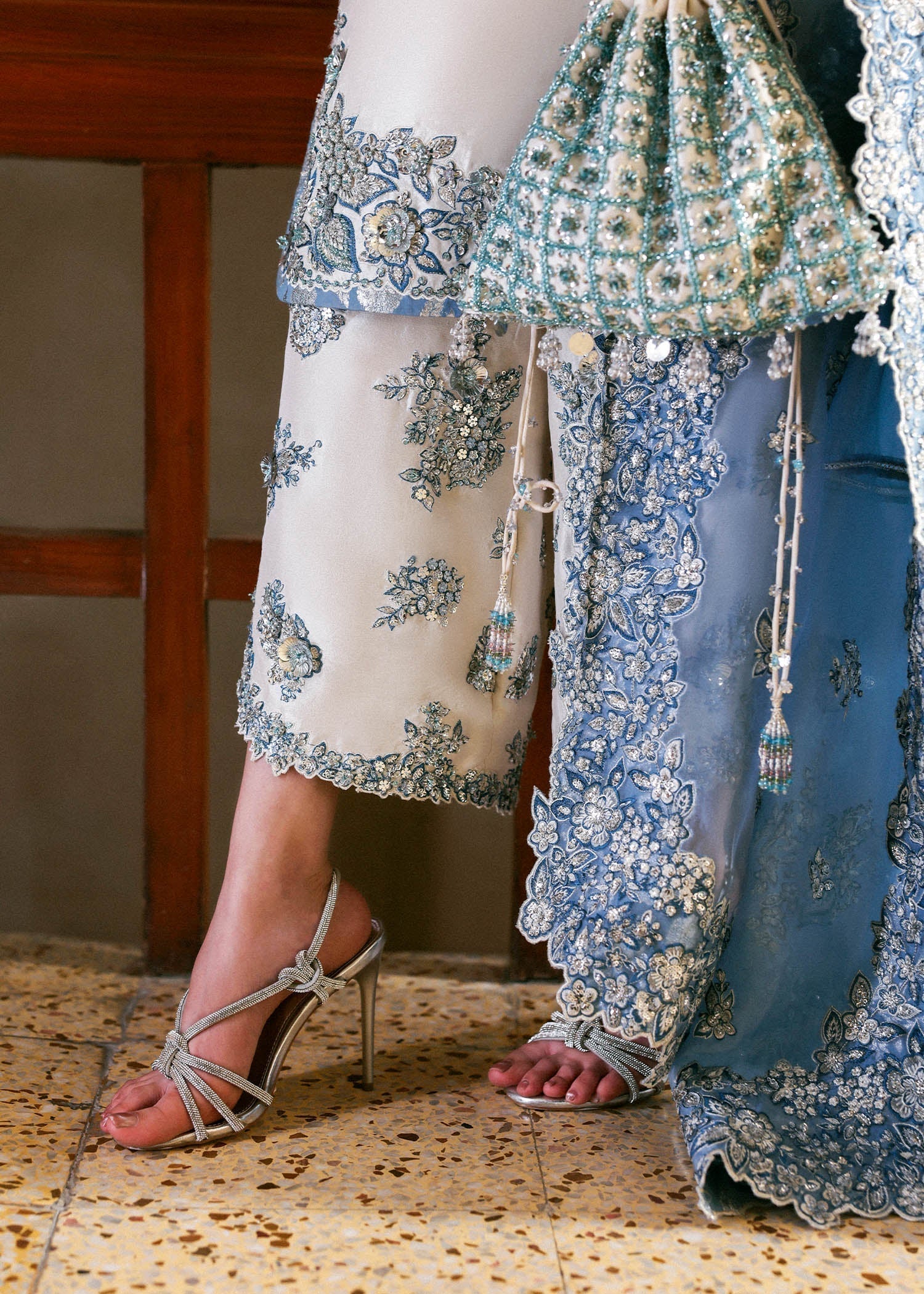 Virelle formal dress with organza dupatta floral embroidery close up
Premium Hussain Rehar Virelle outfit detailed cutwork and embellishments
Elegant Virelle formal suit ensemble full look