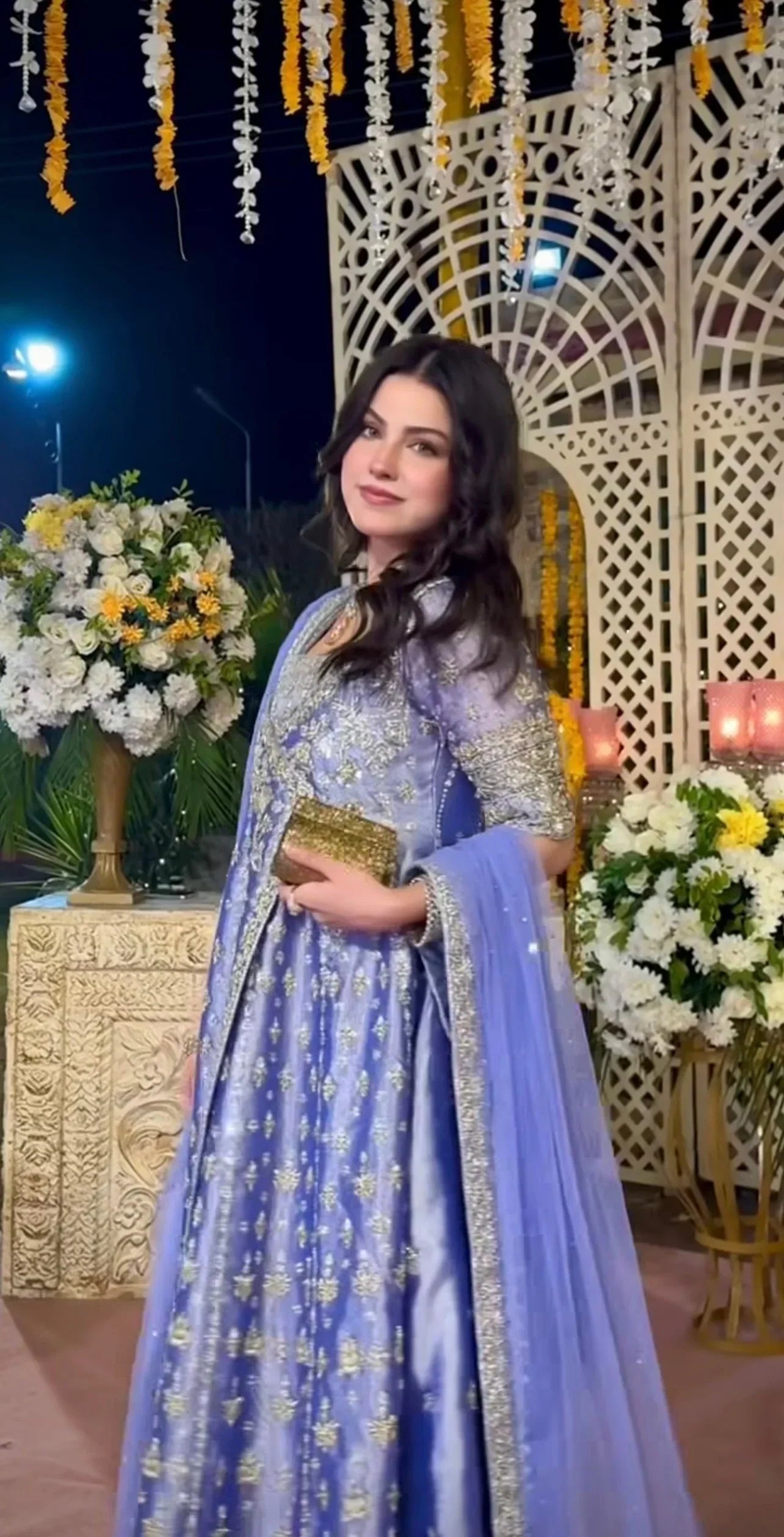 side view of model wearing eyena formal embroidered suit