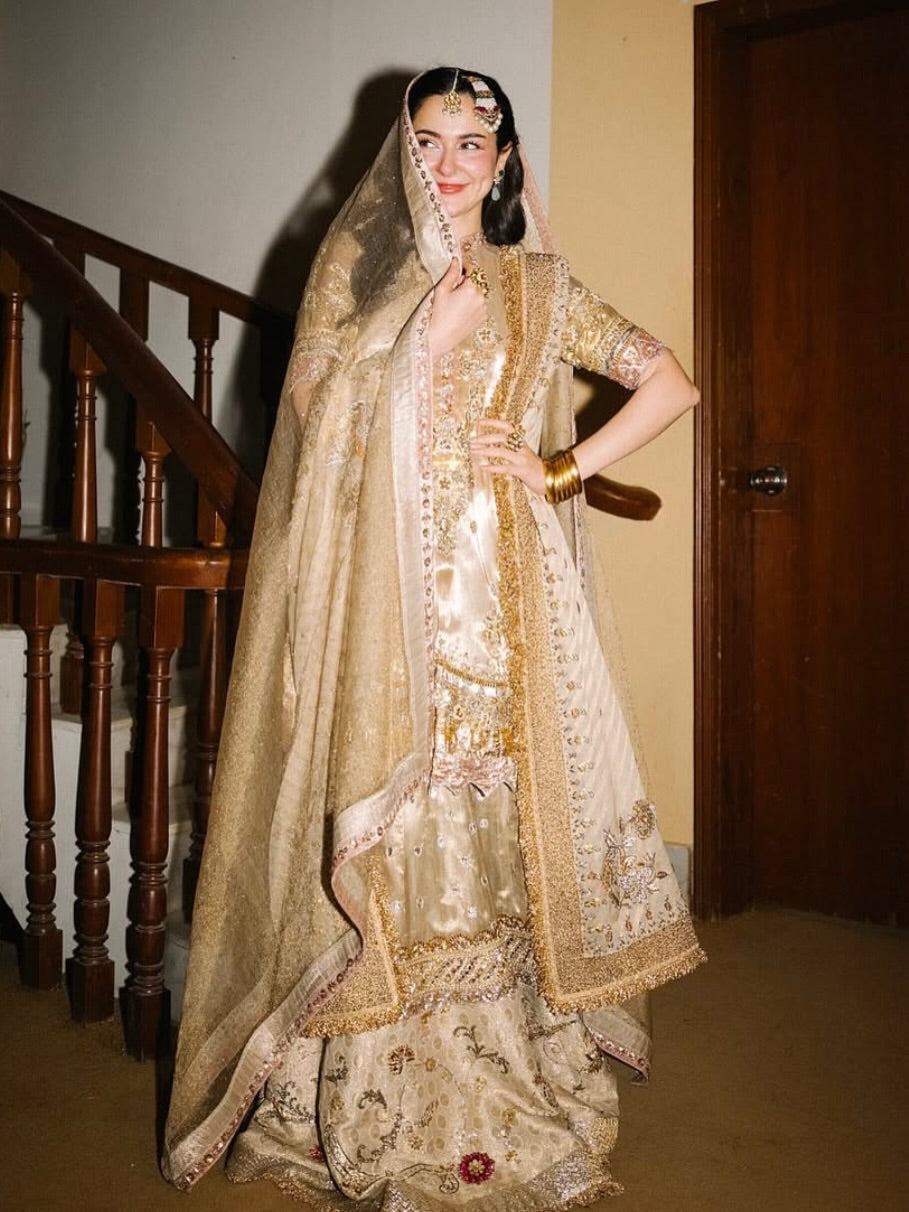 Embellished bridal dupatta with detailed borders in golden wedding edition