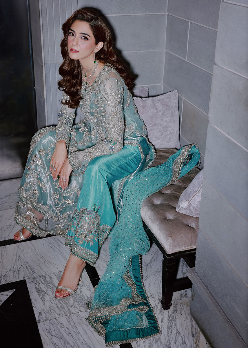 Ferozeah Sara Rohale Asghar luxury aqua embroidered formal dress front view
Aqua luxury formal dress with silver embroidery by Sara Rohale Asghar