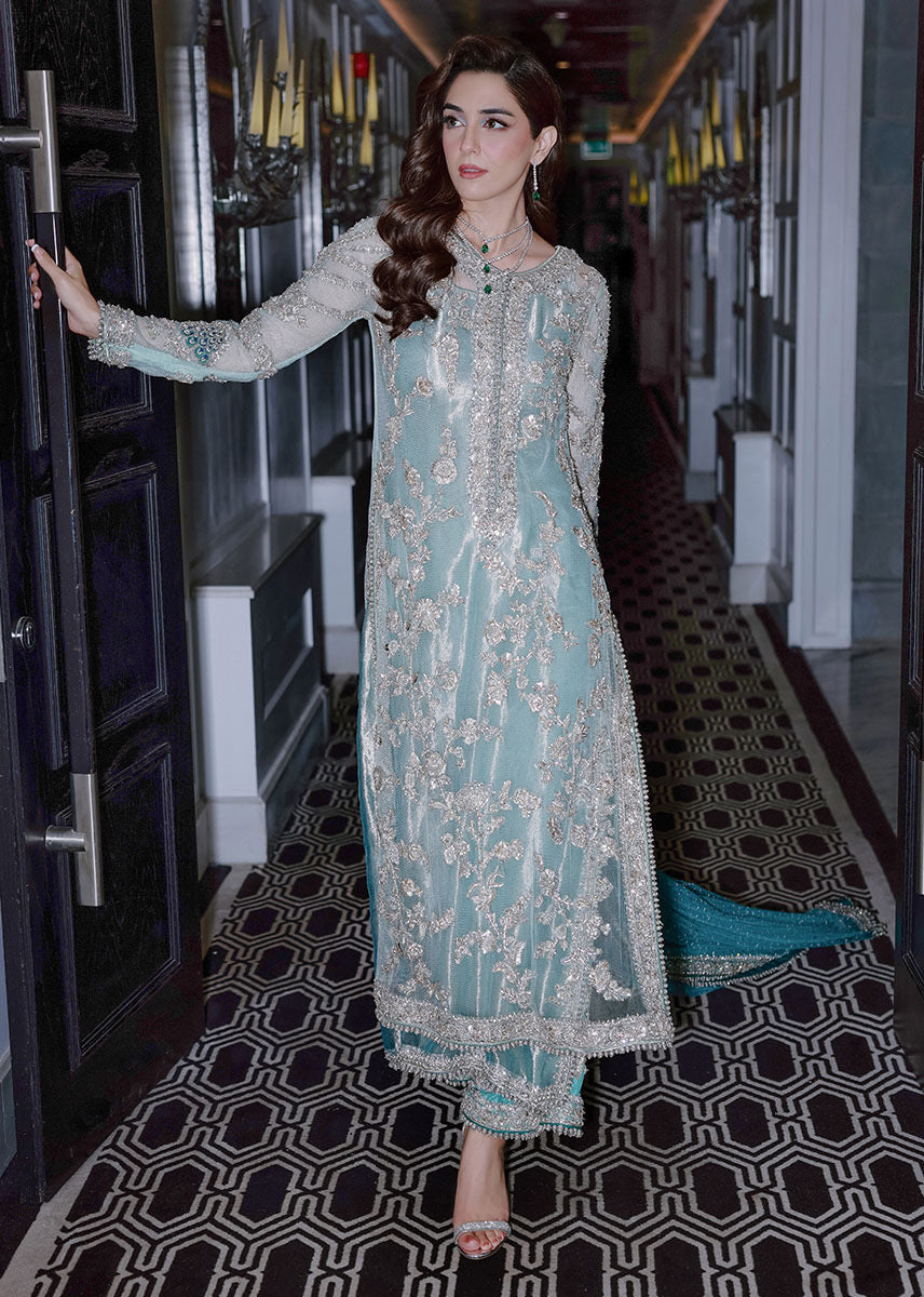 Ferozeah Sara Rohale Asghar luxury aqua embroidered formal dress front view
Aqua luxury formal dress with silver embroidery by Sara Rohale Asghar