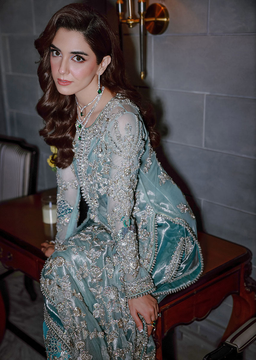 Ferozeah Sara Rohale Asghar luxury aqua embroidered formal dress front view
Aqua luxury formal dress with silver embroidery by Sara Rohale Asghar
