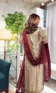 Back view of Haris Shakeel Nawal couture dress with graceful fall and detailed craftsmanship