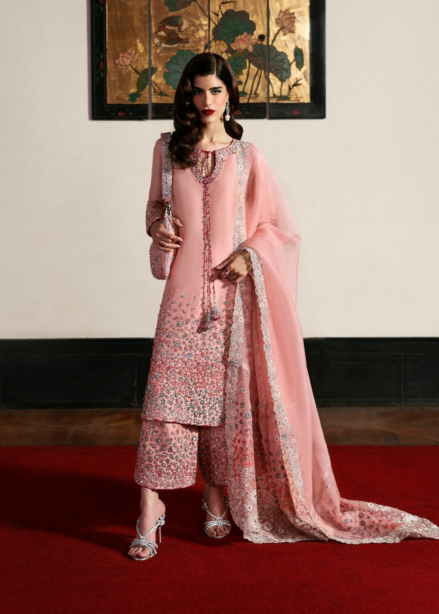 Woman wearing Hussain Rehar Evara blush pink embroidered luxury pret suit front full view