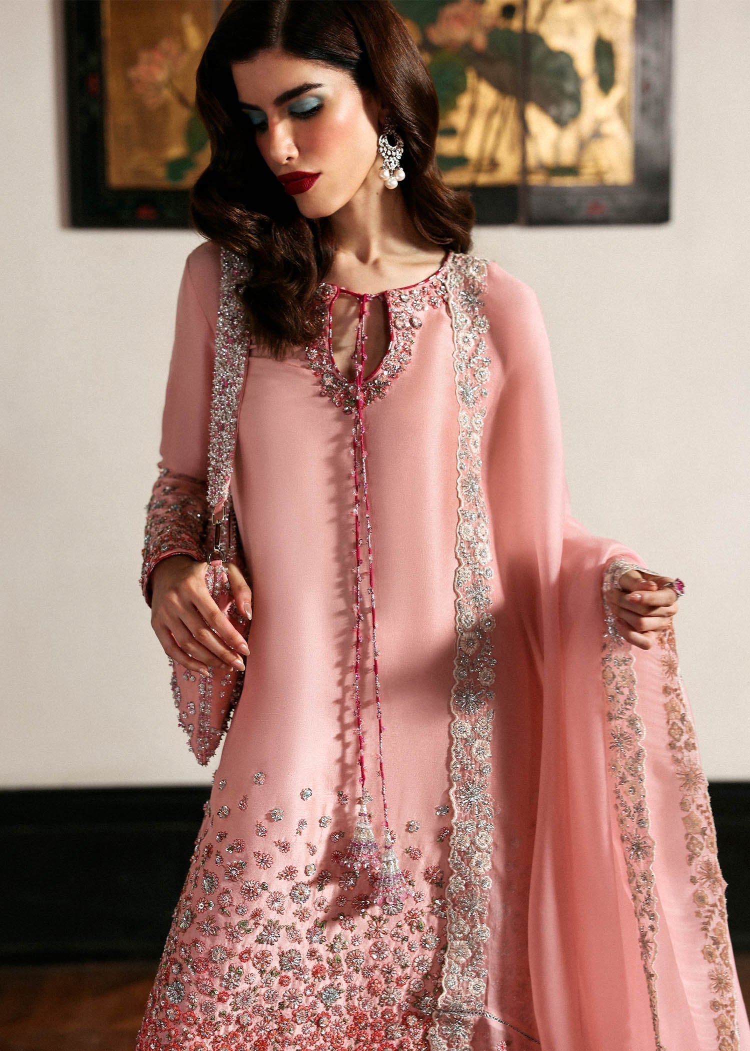 Close up of floral embroidery and sequin embellishment on Hussain Rehar Evara blush pink shirt