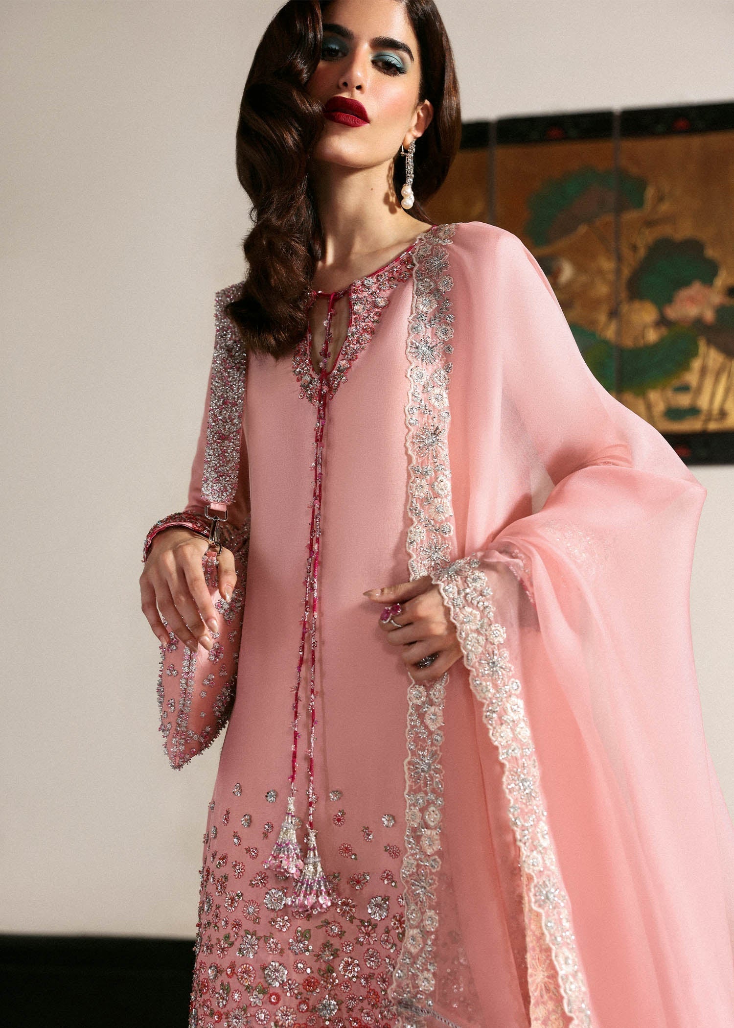 Close view of Hussain Rehar Evara blush pink shirt highlighting intricate floral embroidery with sequin embellishments on raw silk