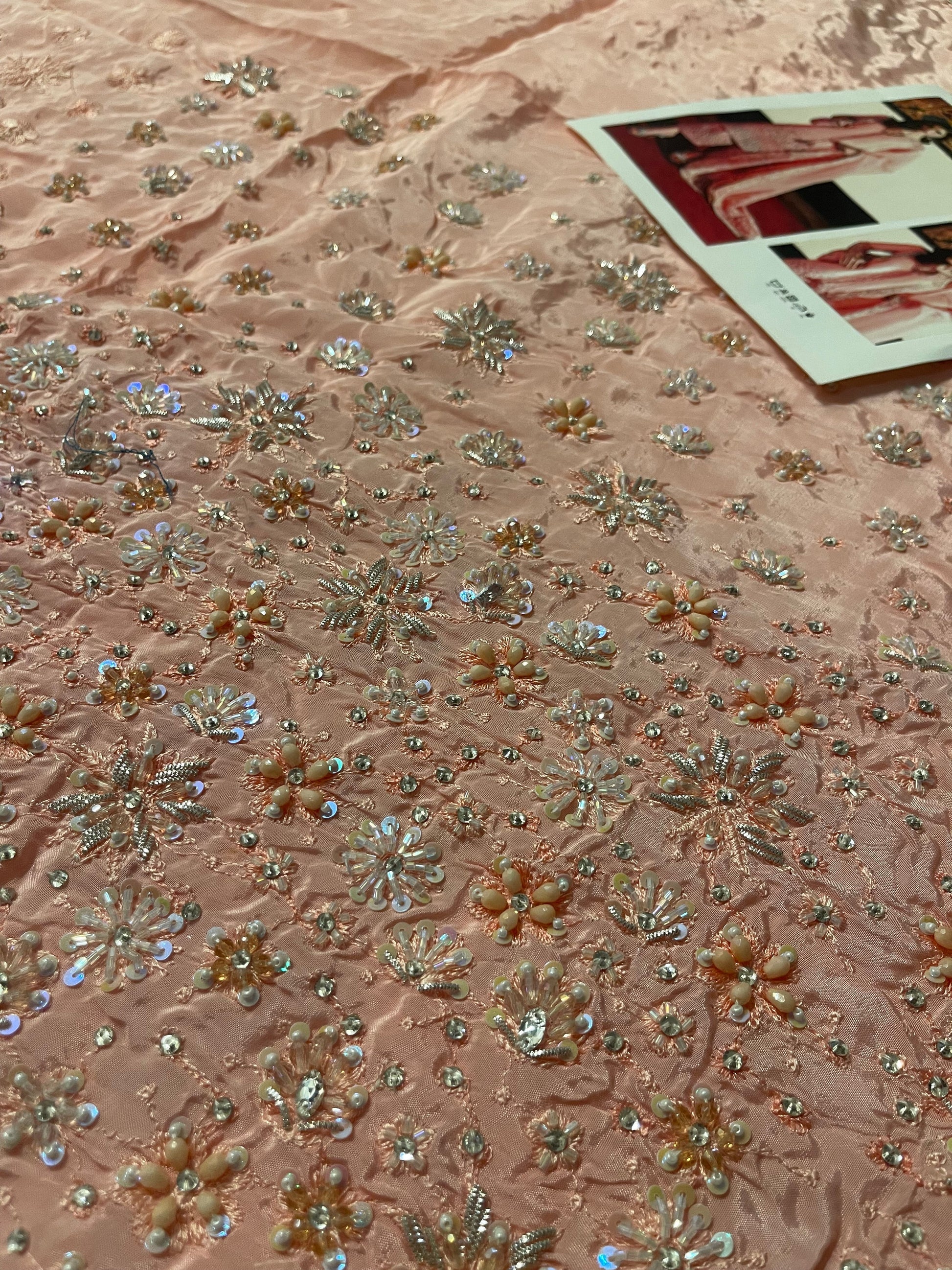 Unstitched embroidered shirt panel of Hussain Rehar Evara featuring intricate floral threadwork and sequin detailing