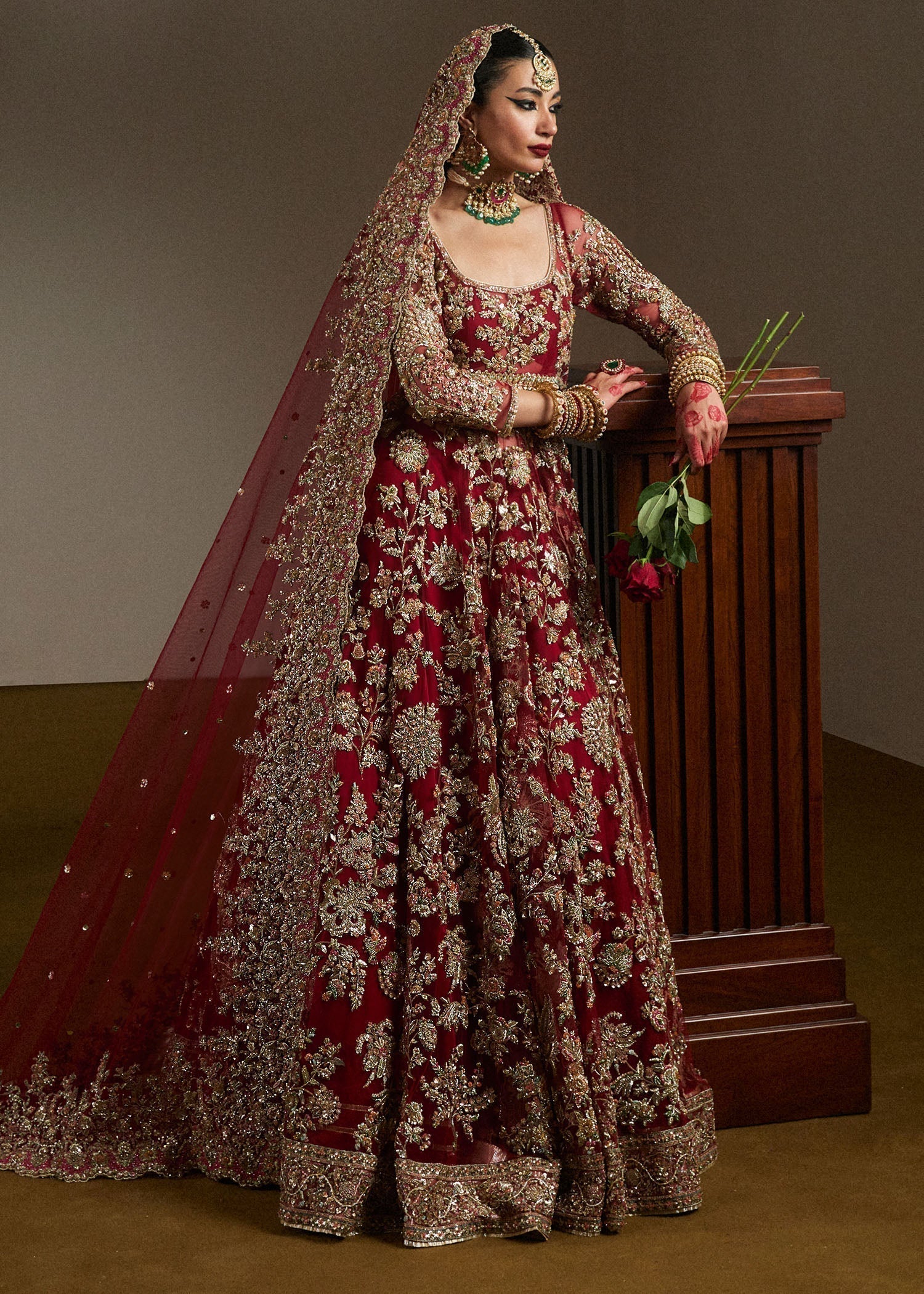 Side view of ruby bridal pishwas lehenga Qashqaye by Hussain Rehar
