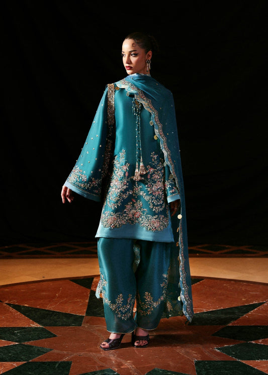 Luxury Hussain Rehar Verta outfit detailed embroidery close up
Elegant teal green embroidered formal ensemble full look