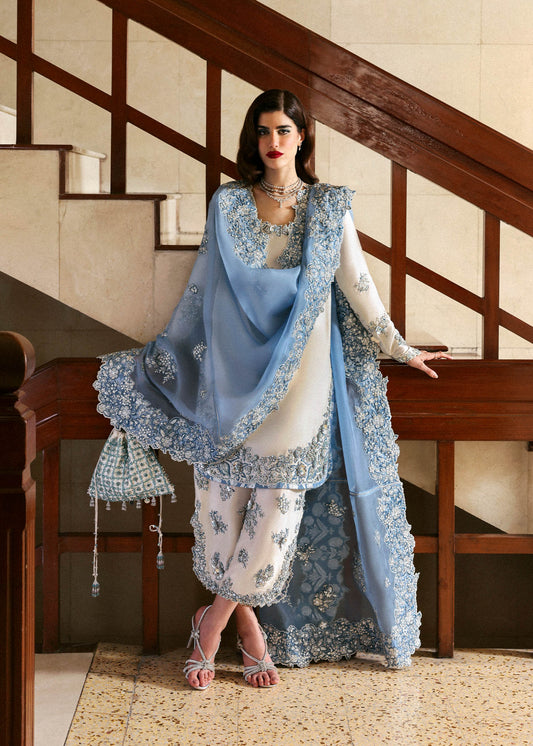 Virelle formal dress with organza dupatta floral embroidery close up
Premium Hussain Rehar Virelle outfit detailed cutwork and embellishments
Elegant Virelle formal suit ensemble full look