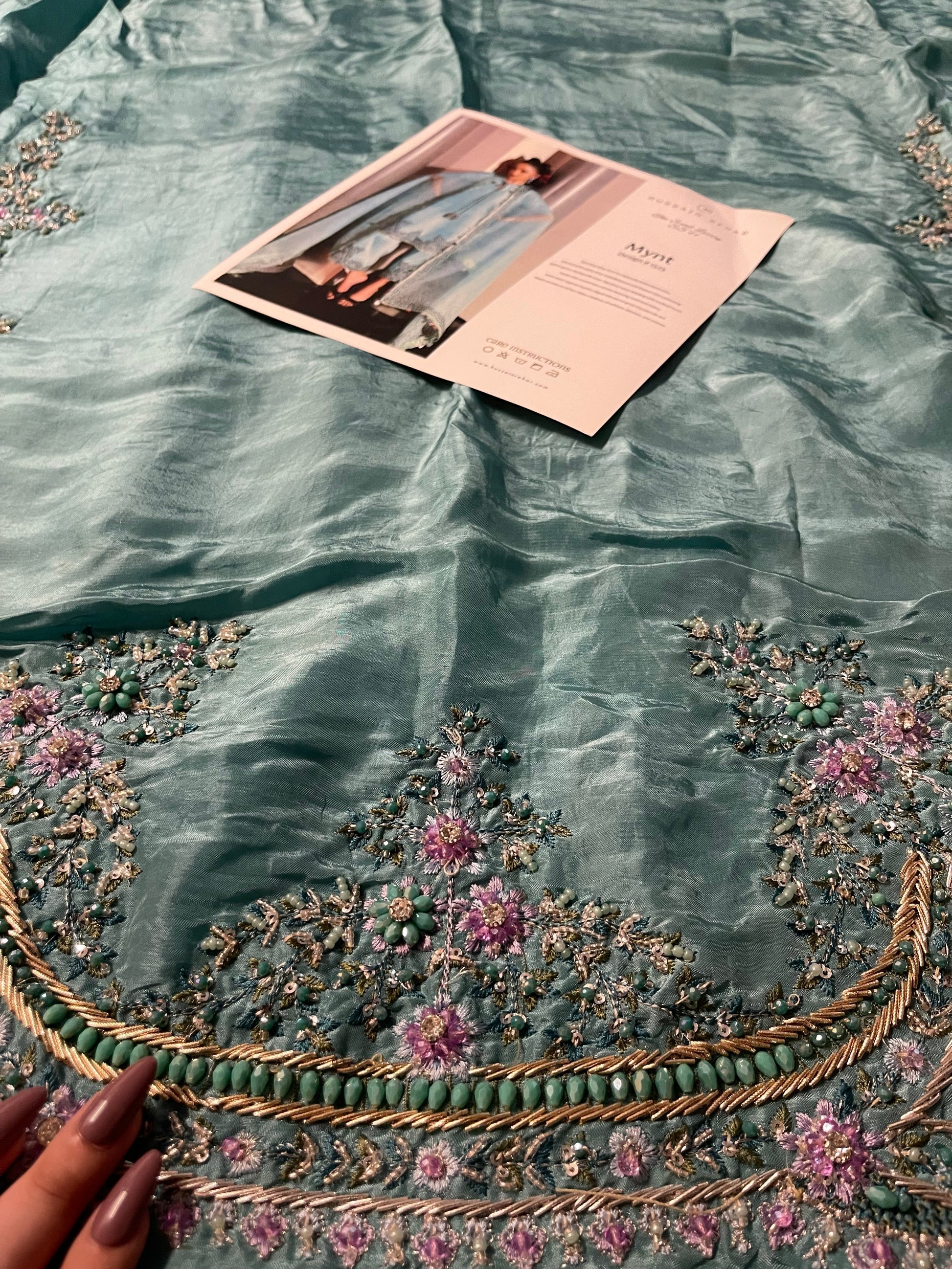 Luxury Hussain Rehar Mynt outfit close up embellishment and tassels
Formal pastel mint blue dress with organza dupatta full look