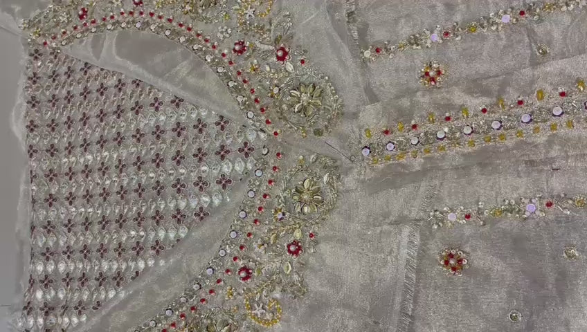 Haris Shakeel gold bridal dress front view with intricate embroidery and traditional design raw video