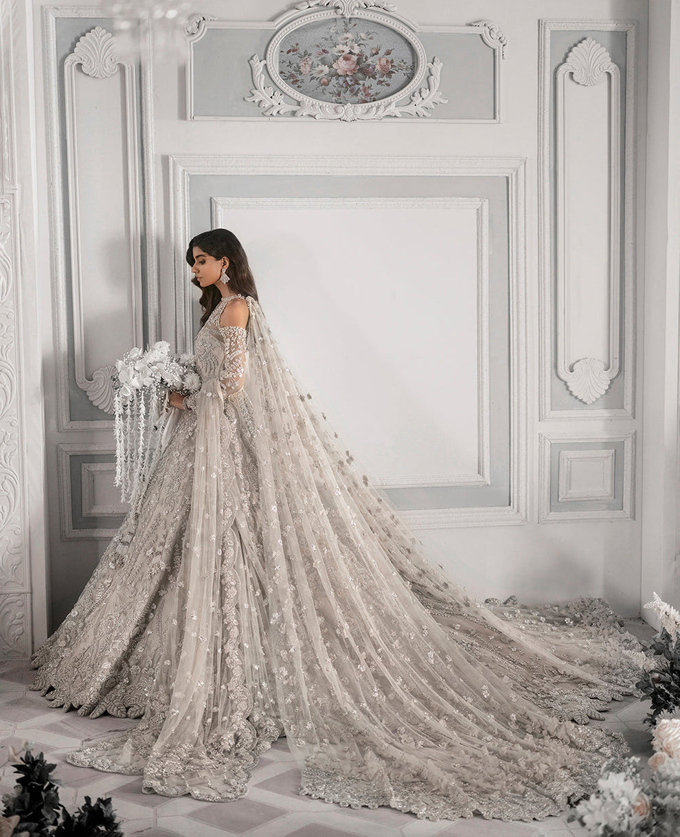 Republic Womenswear  bridal ensemble with intricate floral embroidery
Luxury pastel formal gown with detailed embellishments Republic 