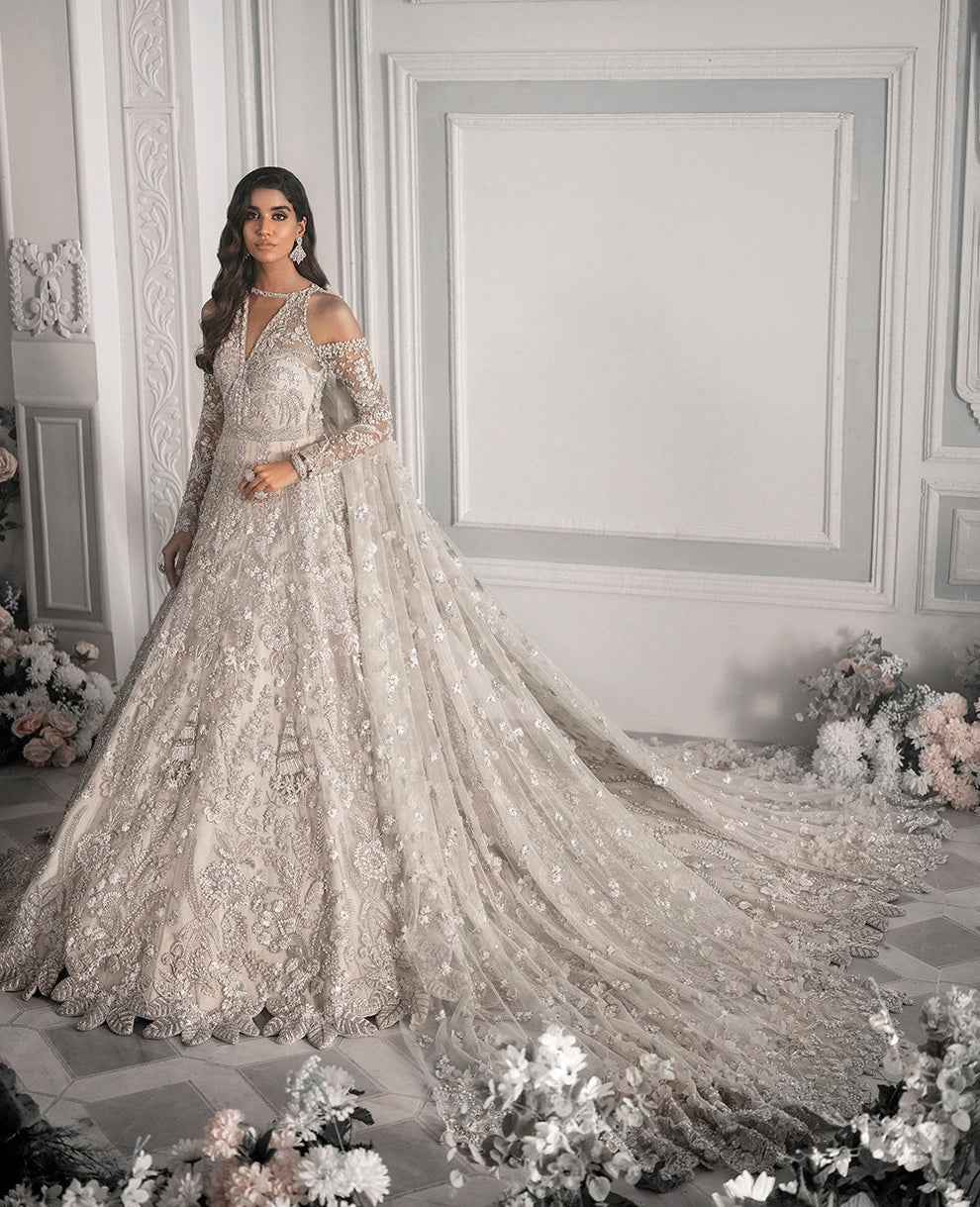 Republic Womenswear  bridal ensemble with intricate floral embroidery
Luxury pastel formal gown with detailed embellishments Republic 