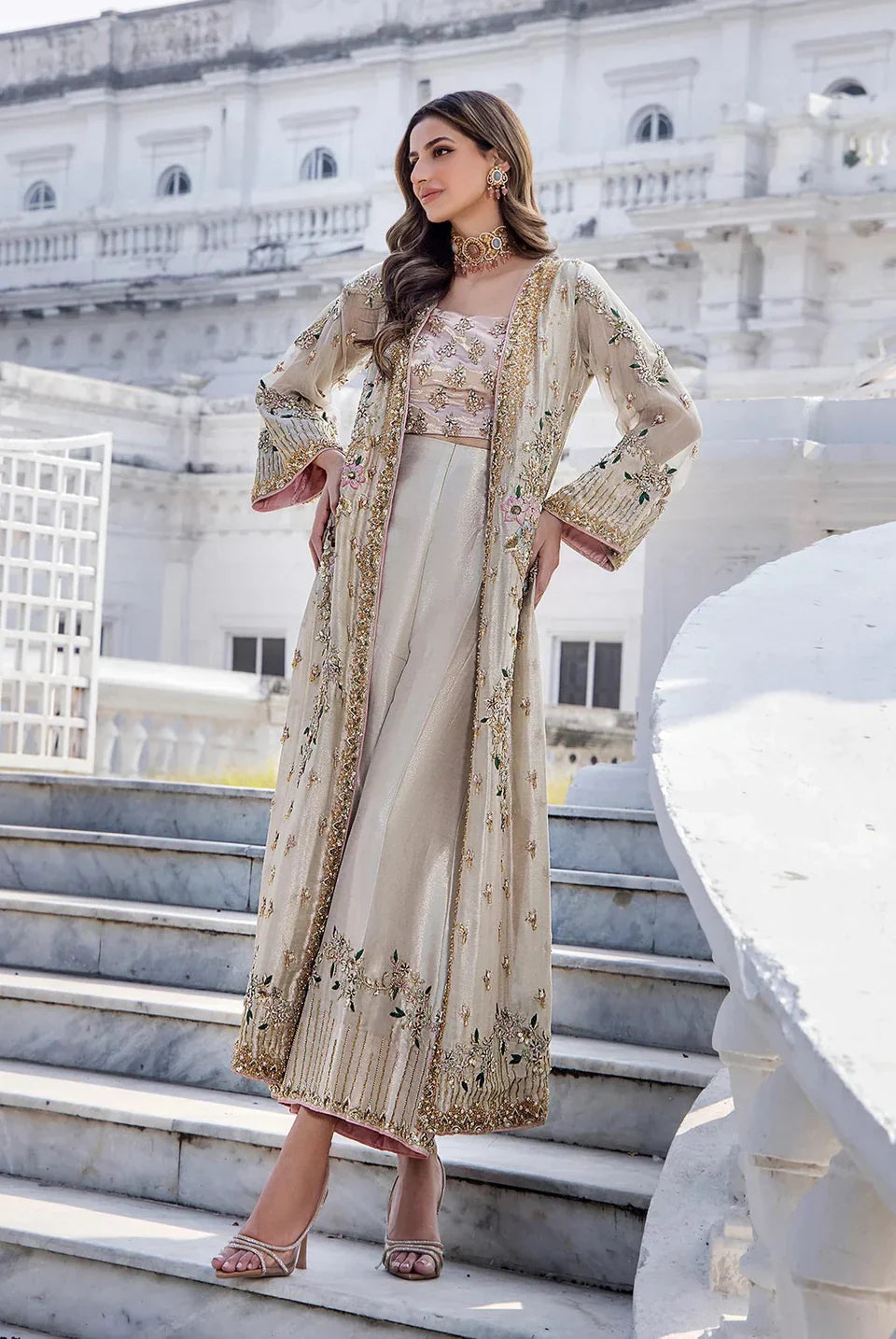 side view of model wearing shano embroidered formal suit