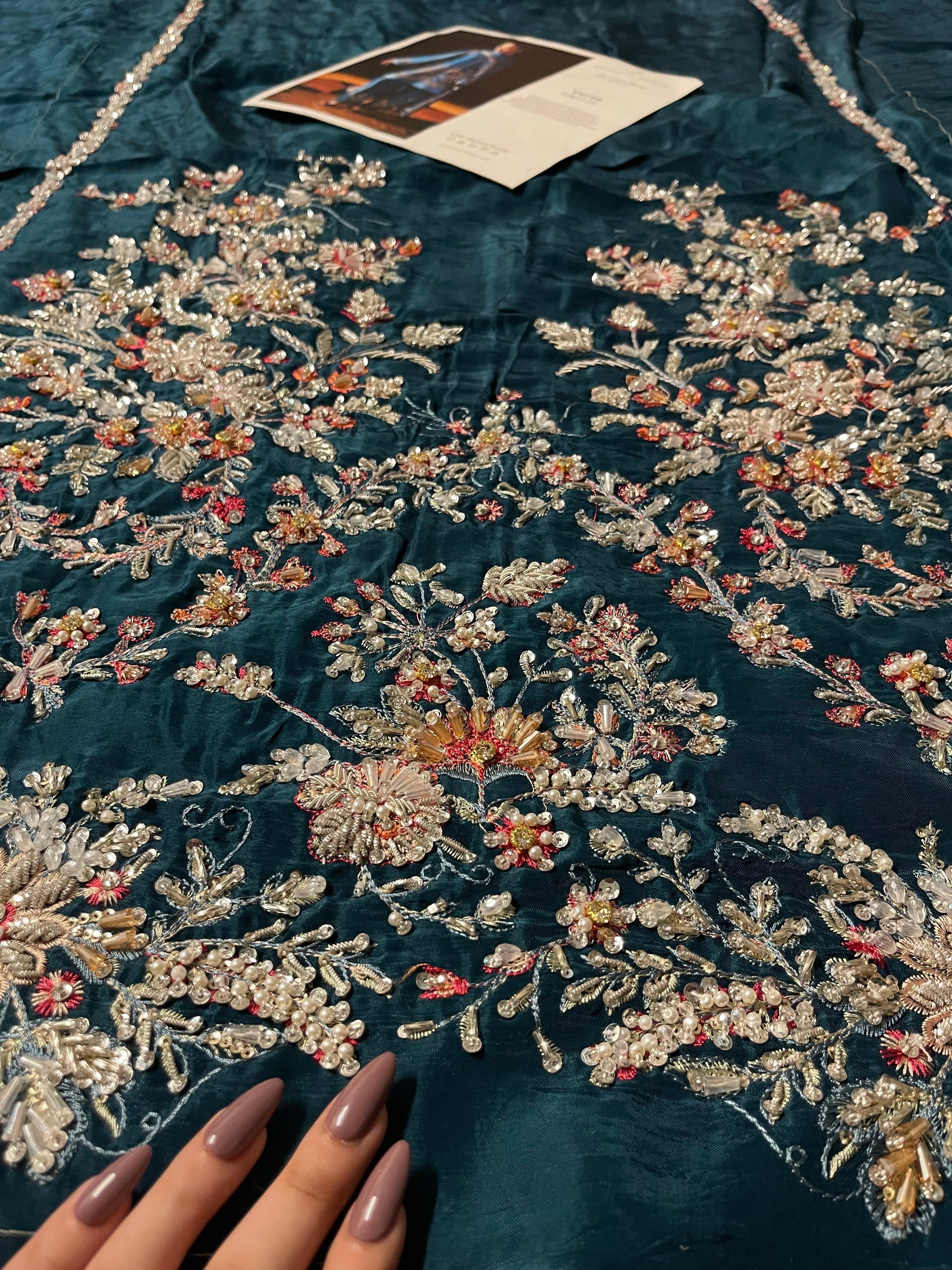 Luxury Hussain Rehar Verta outfit detailed embroidery close up
Luxury Hussain Rehar Verta outfit detailed embroidery close up
Elegant teal green embroidered formal ensemble full look