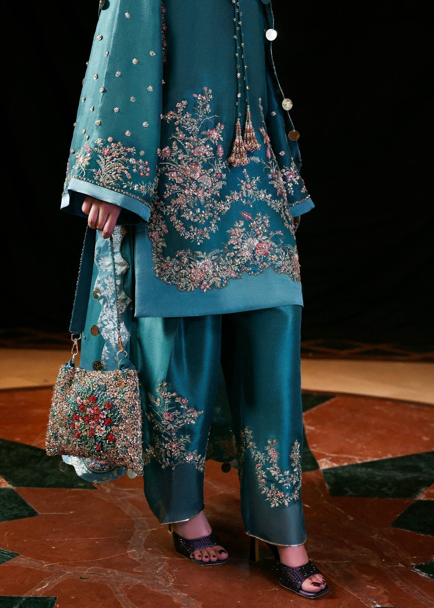 Luxury Hussain Rehar Verta outfit detailed embroidery close up
Elegant teal green embroidered formal ensemble full look