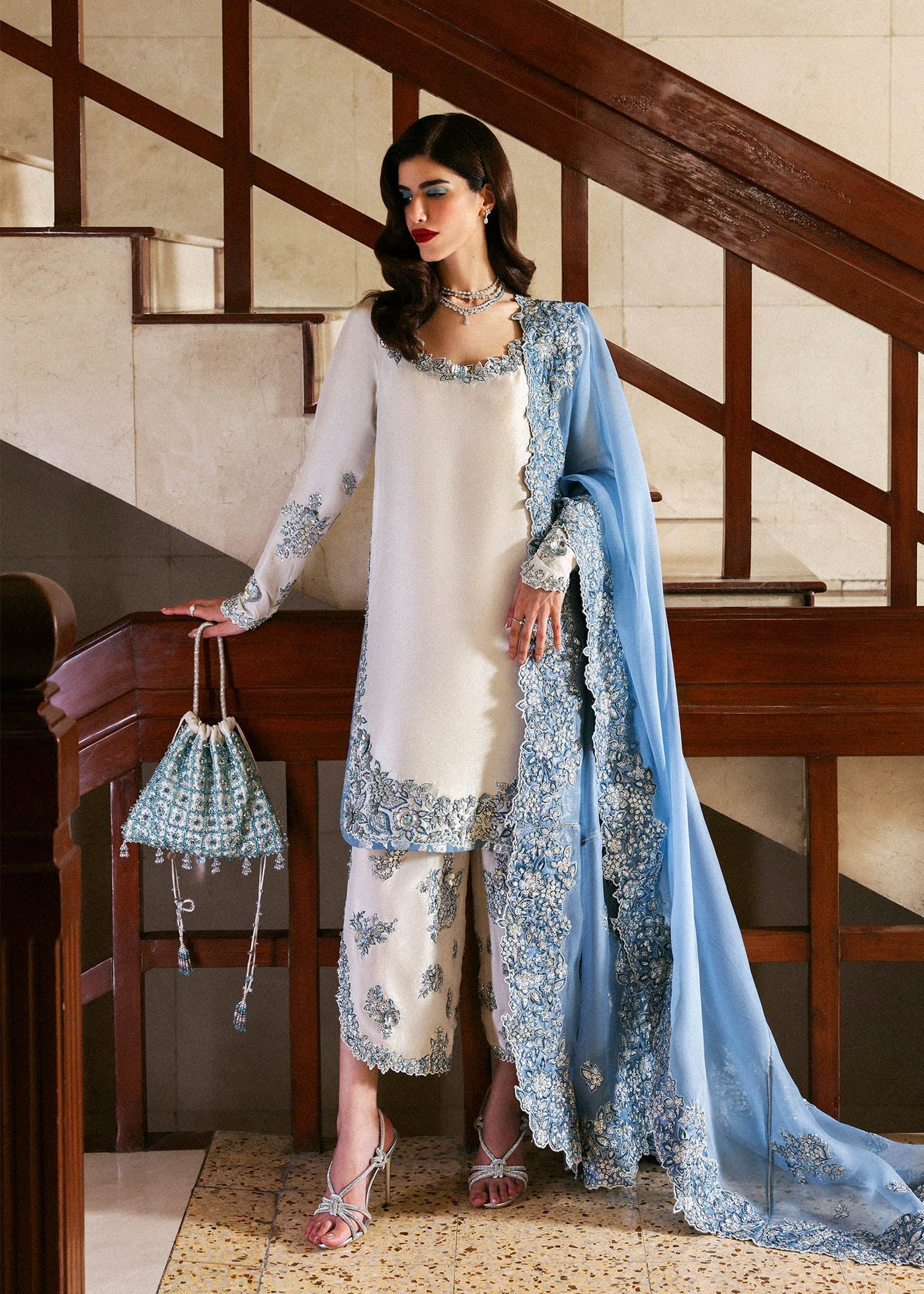 Virelle formal dress with organza dupatta floral embroidery close up
Premium Hussain Rehar Virelle outfit detailed cutwork and embellishments
Elegant Virelle formal suit ensemble full look