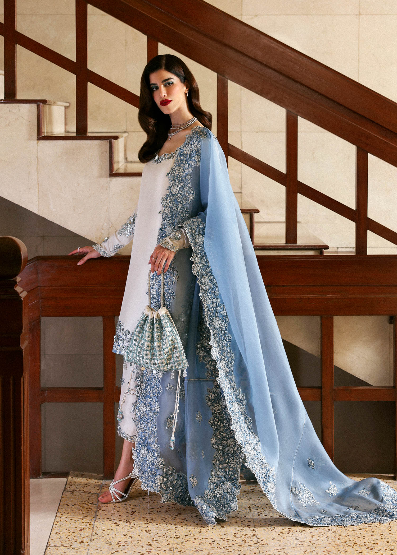 Virelle formal dress with organza dupatta floral embroidery close up
Premium Hussain Rehar Virelle outfit detailed cutwork and embellishments
Elegant Virelle formal suit ensemble full look