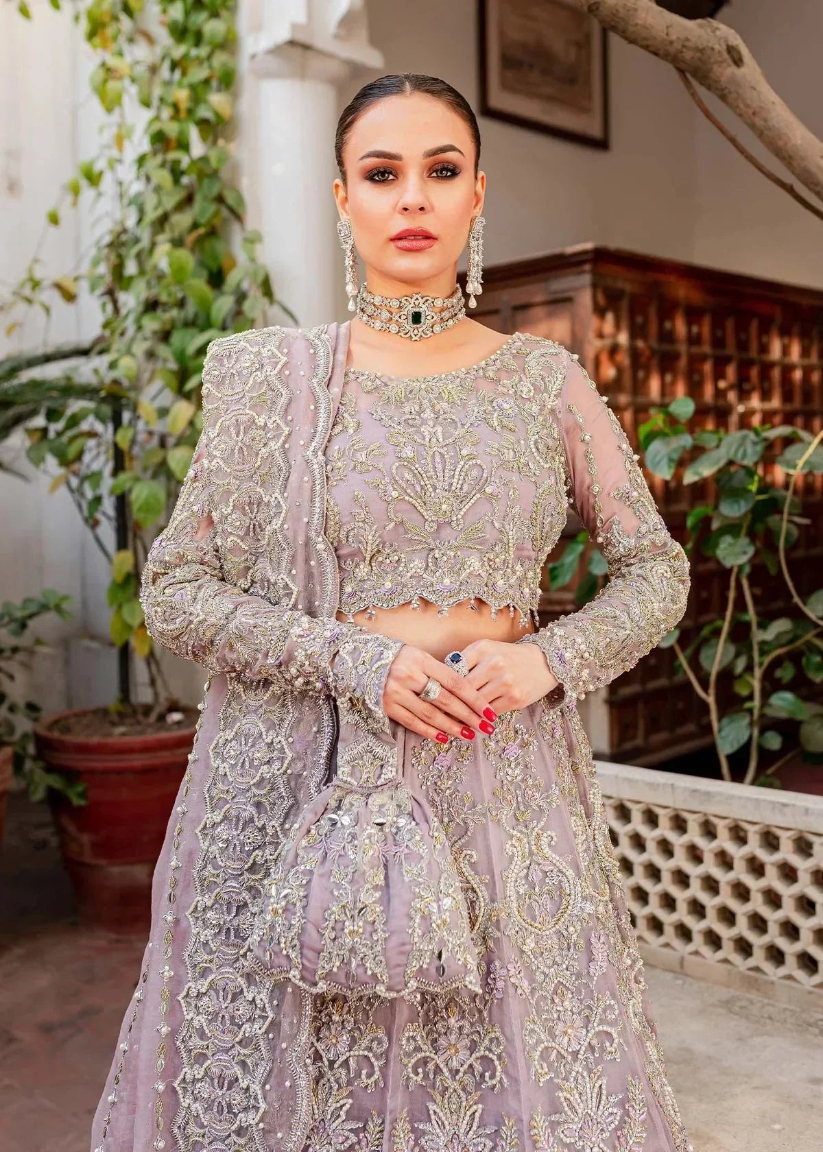 Close full view of Zaarish Kanwal Malik bridal lehenga showing detailed pearl sequin and embellished panels